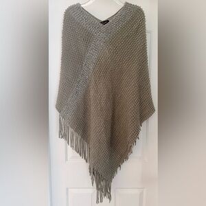 Eyefull Knit Fringe Poncho in Taupe and Gray